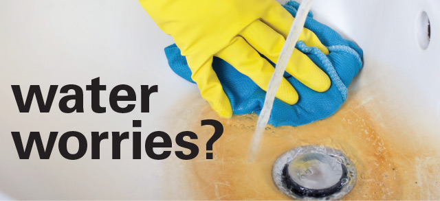 hand scrubbing rusty sink